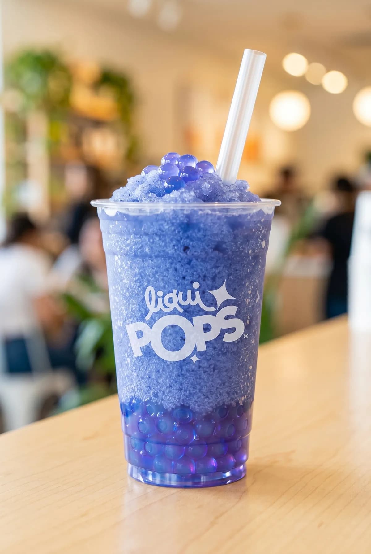 Granizado de maracuya con perlas explosivas amarillas LiquiPops — vaso para llevar en local