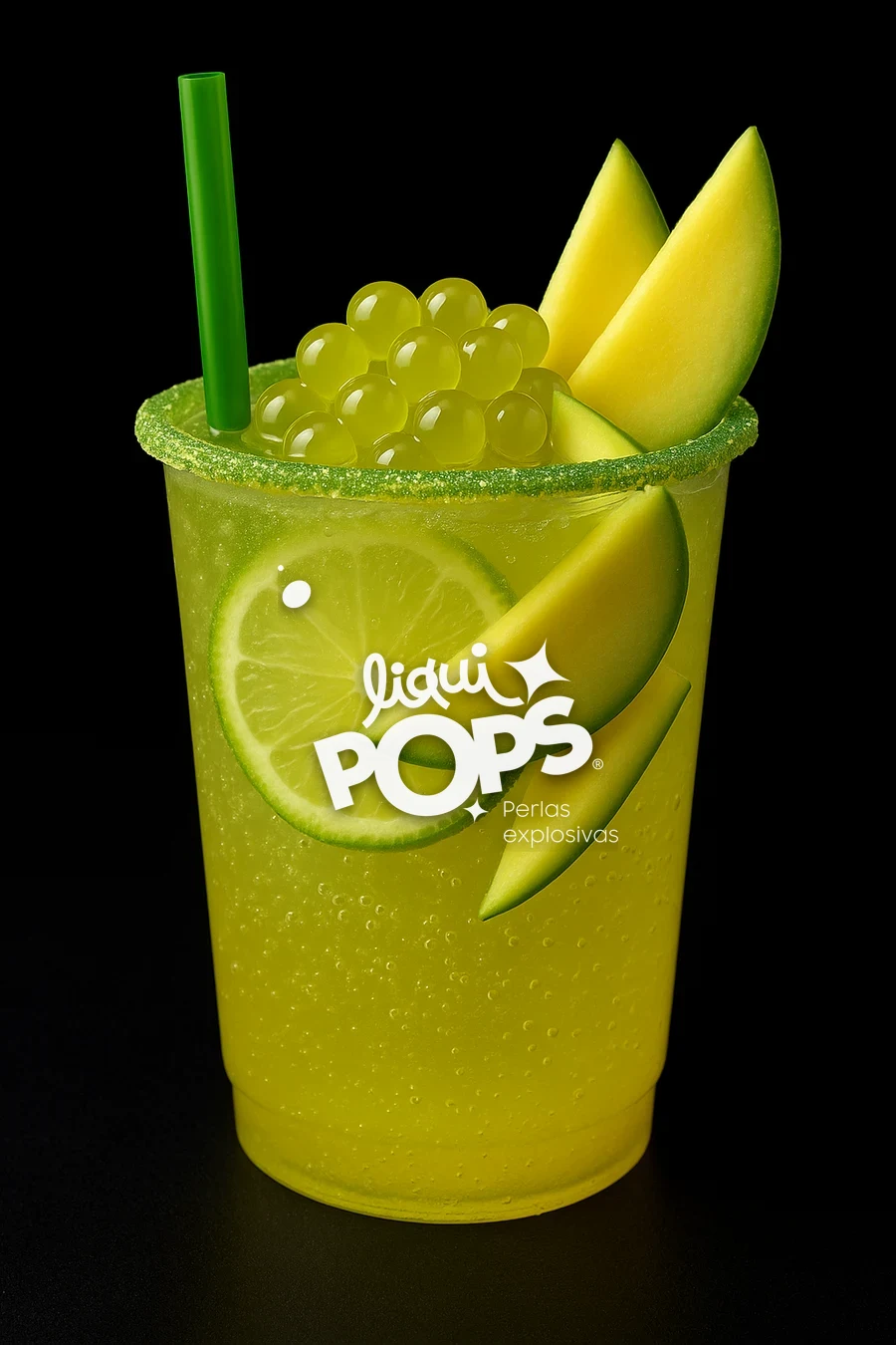 Soda de mango biche amarillo verdosa con perlas explosivas LiquiPops, tajadas de mango y limon en vaso escarchado